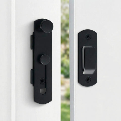 Barn Door Lock Set With Sliding Door Hardware In Carbon Steel Black Finish displayed on white door, showing latch and handle.