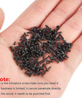 Hand holding Miniature Phillips Screw Assortment Kit 1000Pcs Tiny Self Tapping Screws For Glasses Watch Clock M1 M1.2 M1.4 M1.7