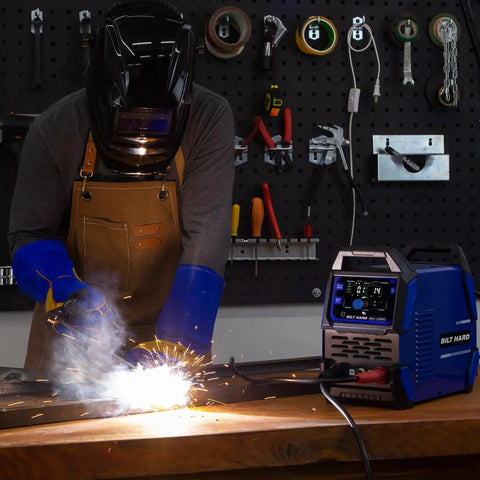 Person using 135A 3 In 1 Welder For Home DIY Boss Level 110V Inverter MIG Flux Core Lift TIG And Stick Welding Machine