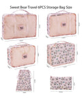 6 Piece Travel Packing Cubes Set Waterproof Pink Twill Luggage Organizers for Business Trips and Vacays on display