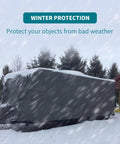 Heavy Duty Tarp 6x8 Foot Waterproof Tarpaulin With Grommets covering an object in snowy weather for winter protection