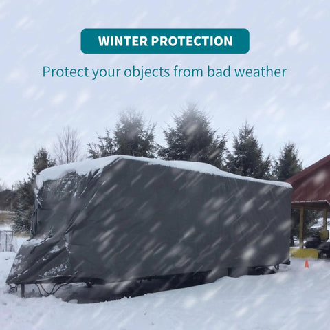 Heavy Duty Tarp 6x8 Foot Waterproof Tarpaulin With Grommets covering an object in snowy weather for winter protection