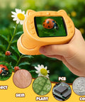 1000X Kid Friendly Digital Microscope With 2.4 Inch 4K IPS Display And 2MP Camera, standalone orange handheld microscope showing a ladybug on a leaf