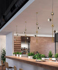 Lit Four Light Smoky Gray Glass Globe Pendant Light With Adjustable Cord And Gold Accents For Kitchen Island Bar Modern LED Chandelier