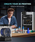 3Kg Filament Dryer SP2 with Storage Box for 1.75mm and 2.85mm Filaments next to 3D printer and printed models on desk