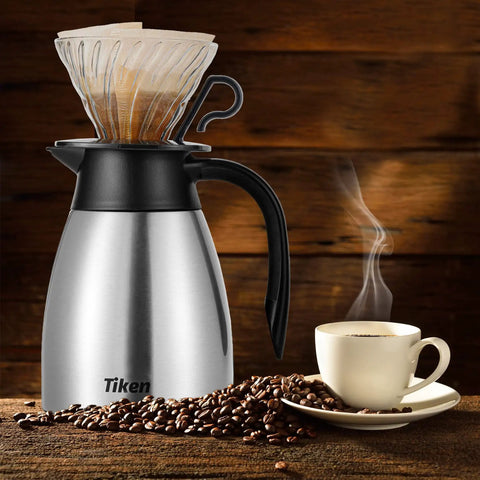 Built Tough 34 Oz Thermal Coffee Carafe With Double Wall Stainless Steel Vacuum Insulation Keeps Your Daily Brew Piping Hot And A Totally Sweat Proof Build Handles Any Commute Or Living Room Setup Smooth Pour Spout Silver with coffee and beans.
