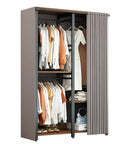 Slick Heavy Duty Walk In Closet Organizer Island With Durable Fabric Enclosure Cover And Three Robust Hanging Rails For Massive Wardrobe Upgrades And Zero Hassle Assembly In Black featuring organized clothes and stylish fabric cover.