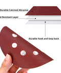 100 Pack Five Inch Eight Hole Sanding Discs Grit From 60 To 2000 showing layers and abrasive surface with hand holding a disc