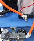 Detail of pneumatic connections on Built Like A Tank 1102 Pound Pneumatic Punch Press With Digital Display Controller.
