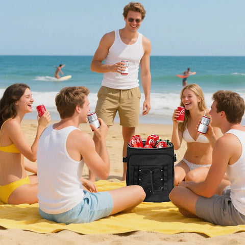 Friends enjoying a beach picnic with a Beast 40 Can Insulated Cooler Backpack With Dual Leak Proof Compartments in black.