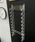 Keep Your Kit Tidy And Looking Fly With This Premium Clear Acrylic Drumstick Holder Display Rack mounted on a wall.