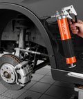 Heavy Duty 8000 PSI Grease Gun Kit with Pistol Grip, 14 oz capacity, connected to automotive brake system