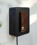 Lockable Outdoor EV Charger Enclosure With Heavy Duty Metal Wall Case For Tesla Connector And ChargePoint Unit mounted on wall.