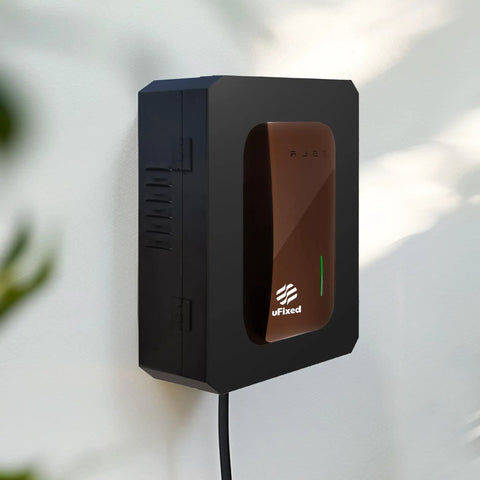 Lockable Outdoor EV Charger Enclosure With Heavy Duty Metal Wall Case For Tesla Connector And ChargePoint Unit mounted on wall.