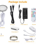 Package contents for RGB Under Cabinet Lights 8 Pack App Controlled Dope Music Sync Puck Lights with plugs, remote, and splitter.