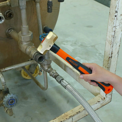 Using Brass Sledge Hammer With Fiberglass Handle Non Magnetic Die Forge Corrosion Resistant 4Lb 16 Inch in industrial setting