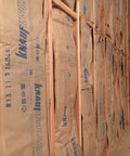 Top Shelf R11 Fiberglass Insulation 8 Pack Comes With Kraft Paper Vapor Barrier Plus Silent Room Noise Blocking Built Straight And Fast For Common 2X4 Interior Walls Blankets Close To 1900 Square Feet Delivering Real Deal Comfort No Sweat Ever, installed in wall stud framing.