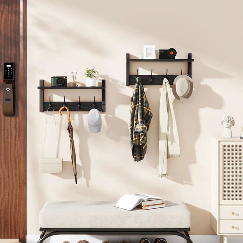 Coat Rack Shelf Wall Mount With 8 Hooks Set Of 2 holding hats, a scarf, a bag, and decorative items in an entryway setup.