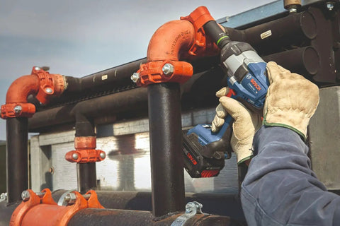 Heavy Duty 18 Volt Cordless Impact Wrench With Half Inch Drive Friction Ring And Beast Mode Torque For Stubborn Bolts Along With Three Speed Settings To Get The Job Done Bare Tool Setup in use on pipes