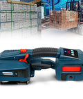 Plug And Play Cordless Strapping Machine That Quickly Seals And Locks Down 13 To 19 Mm Pp Pet Shipping Straps Tight As A Drum With Zero Stress Or Headache in warehouse setting.