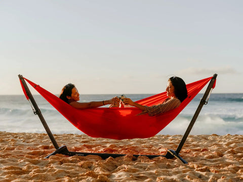 Two people relaxing on beach in Roo Double Hammock With GravitasX Water Resistant Breathable Ripstop Fabric Ultra Comfortable Lounger