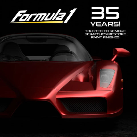 Front view of a red sports car showcasing shine, promoting Formula 1's 35 years of scratch and paint finish restoration expertise.