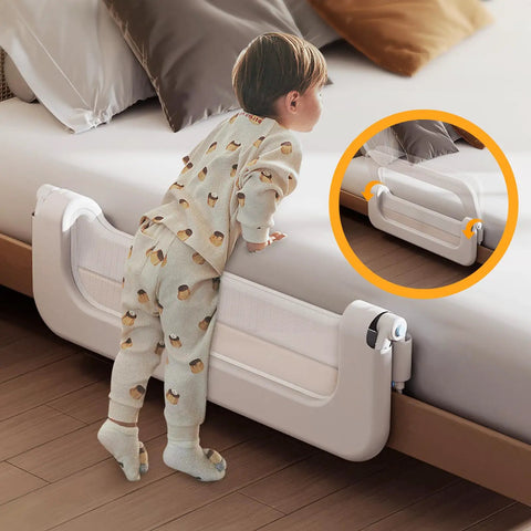 Toddler Bed Rail Guard With 14 Height Adjustable And Swing Down Design For Extra Tall Child Safety On Queen King Twin And Bunk Beds Easy Fold No Fuss One Click Setup For Safer Sleep in beige with a toddler leaning on it.