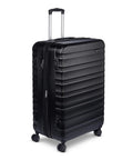 Amazon Basics 30in black hardside luggage front view with four spinner wheels and scratch-resistant shell.