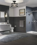 Bathroom with Purist Single Tube Sconce with Dope Frosted Glass Shade installed beside mirror, brushed brass finish.