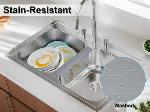 Double Sink Mat Protector With 36 Suction Cups No Odor No Stains Super Soft Divider Pad Shields The Center Of A Double Sink While You Wash Dishes Kitchen Accessory 12.83 By 11.1 Inches in use on a kitchen sink with dishes.