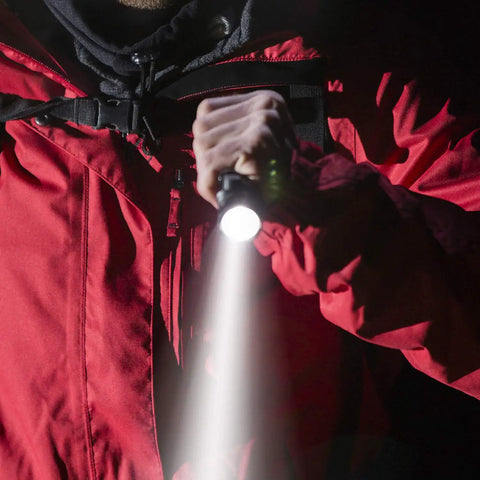 Person using LED Tactical Flashlight PTAC1000 Two Pack With One Mode Operation, High Lumen Output, Zoomable Beam, Water Resistant