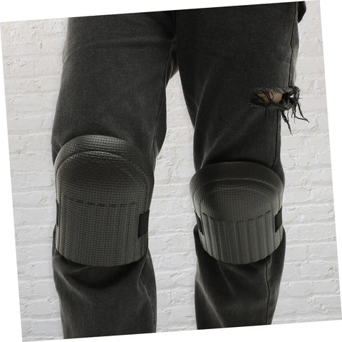 Heavy Duty Work Knee Pads For Men And Women With Tight Non Slip Grip Two Pairs In Sharp Blue And Black delivering sick cushioning on black pants.