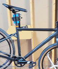 Must Have Space Saving Bike Repair Stand For Easy Maintenance, Beast Of A Clamp With 1.2 To 2.5 Inch Range in use on wall mount