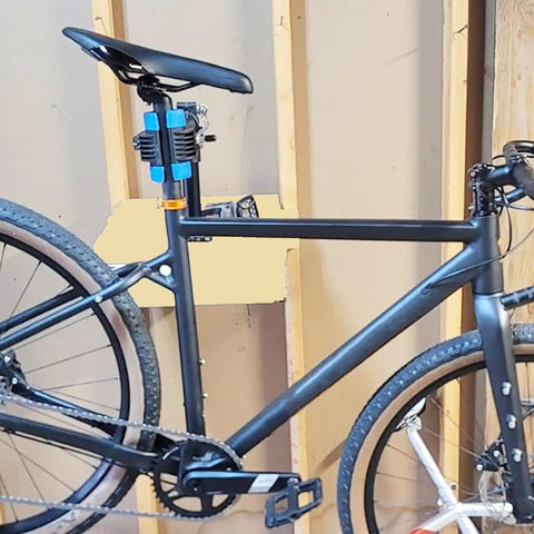 Must Have Space Saving Bike Repair Stand For Easy Maintenance, Beast Of A Clamp With 1.2 To 2.5 Inch Range in use on wall mount
