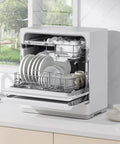 Compact Countertop Dishwasher Five Place Settings Fully Automatic Smart Air Dry with clean plates and glasses inside.
