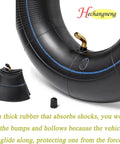 Heavy Duty Inner Tubes For 4.10/3.50-5 With TR-87 Bent Valve Stem, 2-Pack, close-up of rubber tube and valve