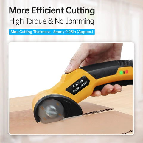 Boss Grade Cordless Electric Scissors For Cardboard Boxes cutting through cardboard, showcasing 6mm thickness capability.