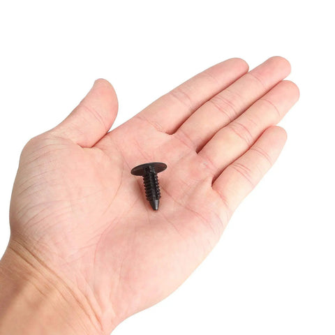 Universal Plastic Golf Cart Rivets Kit One Quarter Inch By Three Quarter Inch 120 Piece Replacement Xmas Tree Push Rivet in hand