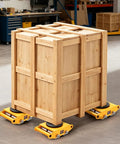 Rip Through Floors Heavy Duty Industrial Dolly Moving Skate Low Profile Machinery Cart with wooden crate on yellow dolly.