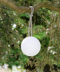 Indoor Outdoor LED Lantern 8 Inch Hanging Orb Delivers Even Light Distribution For Cozy Vibe Portable And Easy To Move Great For Patio Porch Deck Or Living Room Light Grey hanging on tree