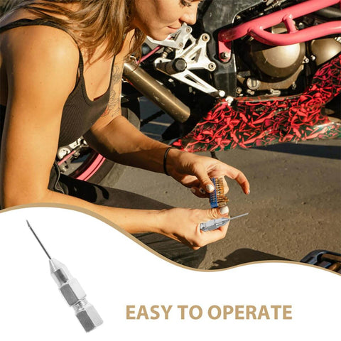 Woman using Grease Needle Nozzle Kit Two Piece Leakproof Fittings For Precision Lubrication Sealed Bearings on motorcycle maintenance