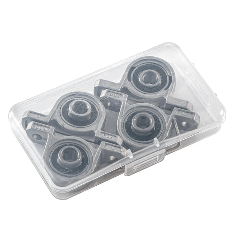 Four 8mm bore ball-mounted pillow block insert bearings in a clear plastic case (top view)