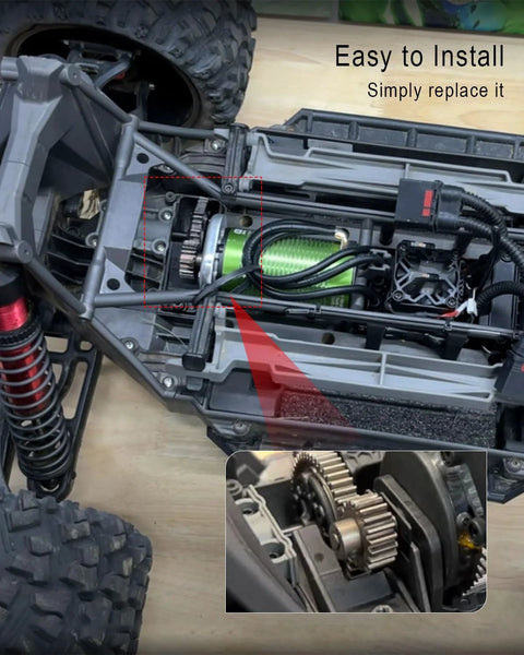 50T hardened steel spur gear with 20T pinion gear installed in RC car drivetrain; green motor visible inside chassis.