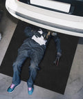 Extra Large Garage Oil Spill Mat 36 By 60 Inches Drip Absorption Mat No Mess For Driveways And Under Cars Durable Reusable Washable With Waterproof Backing Protects Floors From Oil Coolant Brake Fluid And Leaks shown under car in garage setting.
