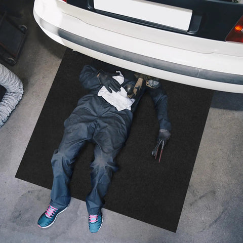 Extra Large Garage Oil Spill Mat 36 By 60 Inches Drip Absorption Mat No Mess For Driveways And Under Cars Durable Reusable Washable With Waterproof Backing Protects Floors From Oil Coolant Brake Fluid And Leaks shown under car in garage setting.