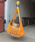 Front view of orange nylon flat hoisting sling net with square mesh for lifting heavy loads