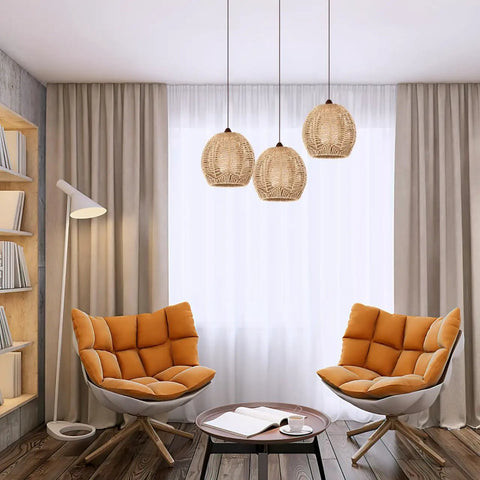 Living room with Vintage Rattan Pendant Light Shade Set For Home Cafe And Teahouse Decor over orange chairs, cozy rustic vibes.
