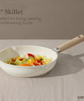 8 Inch White Granite Nonstick Frying Pan Skillet With Heavy Duty Cast Aluminum Induction Base for Eggs and Omelets on Tablecloth