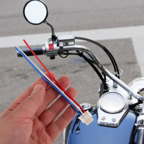 Universal Motorcycle Wiring Harness Connector Kit With Horn Headlight Turn Signal Heavy Duty Relay in hand on bike
