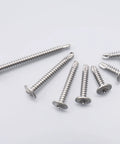 Heavy Duty 410 Stainless Steel Number Eight Half Inch Self Tapping Screws For Metal And Wood Two Hundred Fifty Piece Pack arranged on a surface.